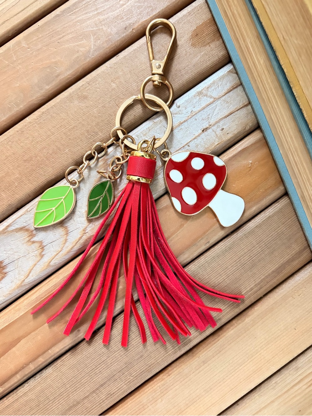 Enameled Mushroom and Leather Tassel Keychain with Green Leaf Charms - Picture 5 of 5